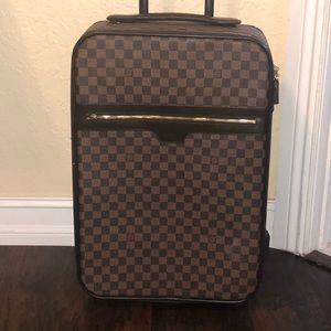 Brown faux leather suitcase with duster